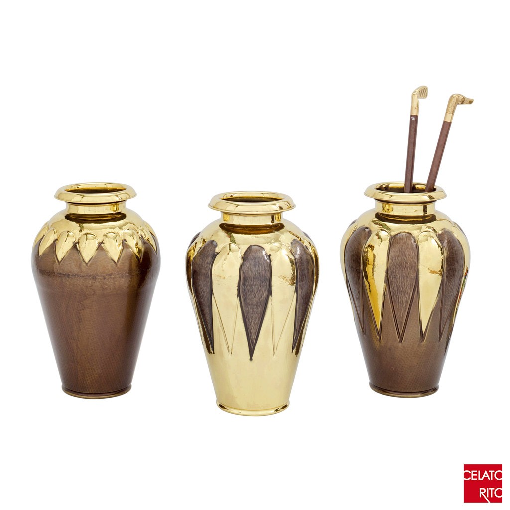 Brass cruse with fesoni